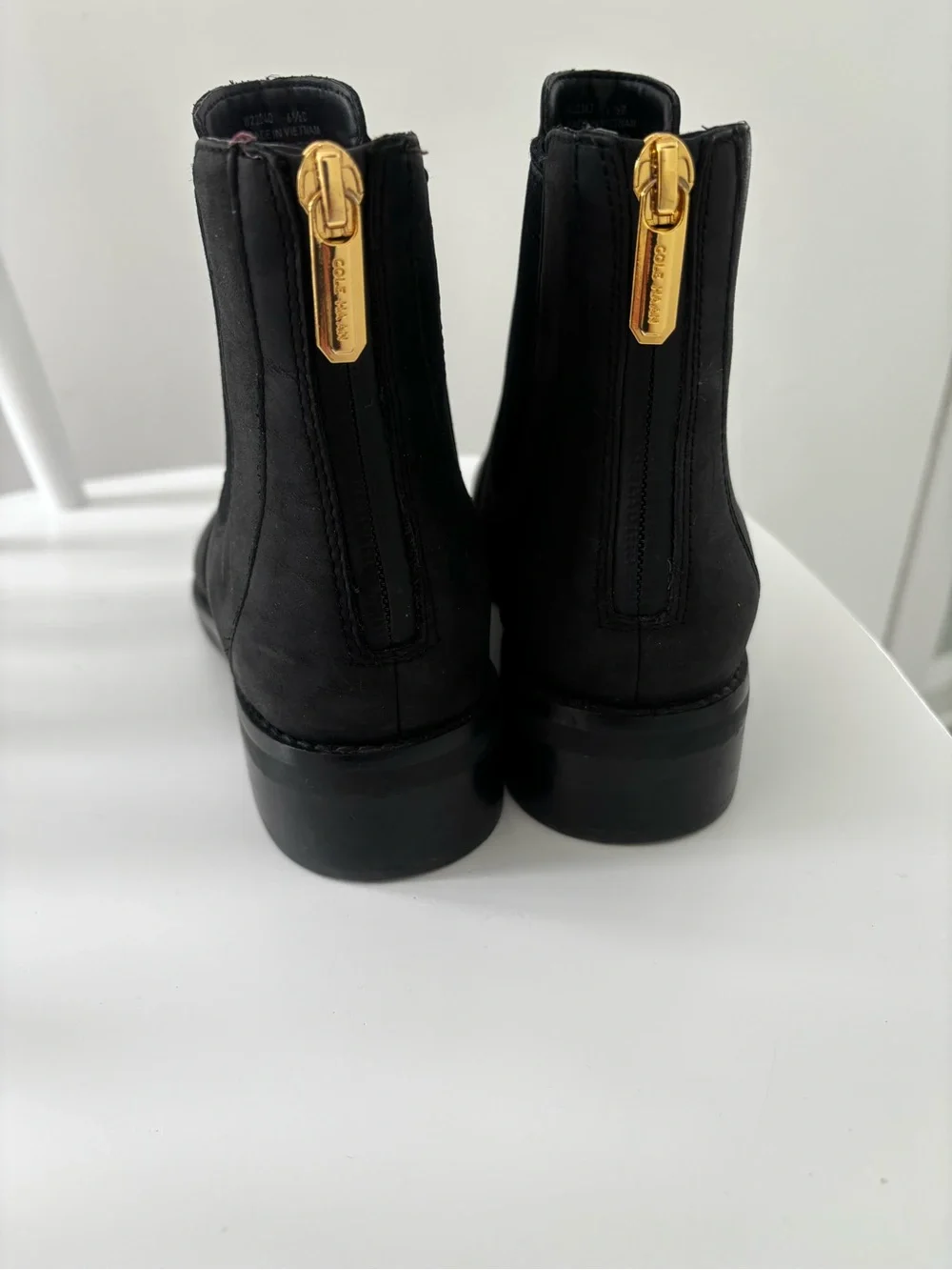 Cole Haan Black Chelsea Ankle Boots with Gold Back Zip